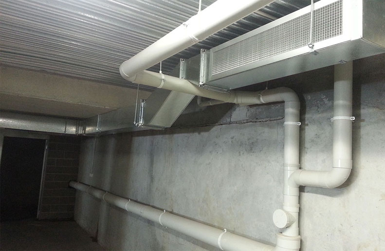 A car park extraction system was installed as per Mechanical Design. The sheet metal ducting had high and low level grilles and was controlled with a Variable Speed drive and Roof Mounted Fantech Fan. 2 x CO2 (Carbon Dioxide) sensors contolled the fan and fire dampers were required through the slab penetrations.