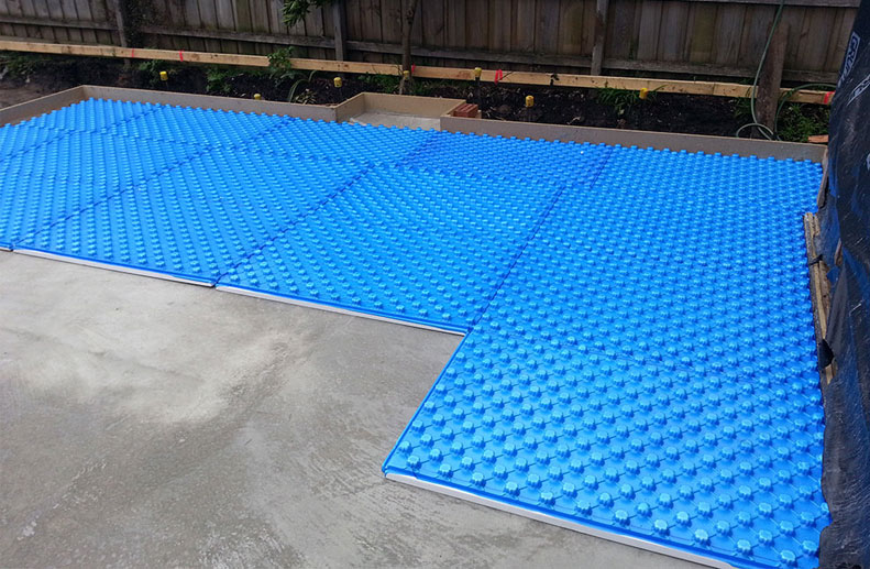 Placement of blue foam for In Screed Hydronic heating in Ivanhoe.