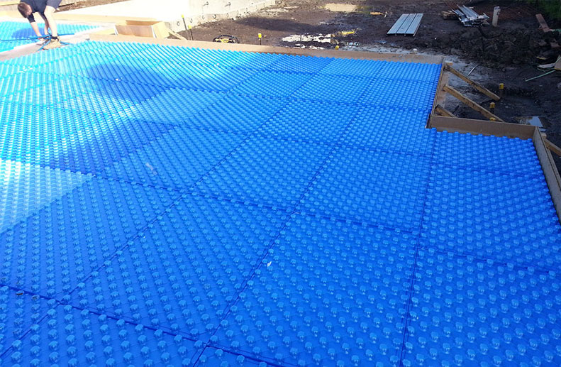 Placement of blue foam for In Screed Hydronic heating in Ivanhoe.