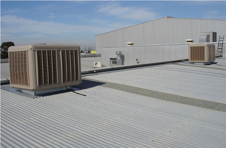 Commercial evaporative cooling installation in Thomastown warehouse. Two Coolbreeze D500 twin fan evap coolers to plenum outlets.