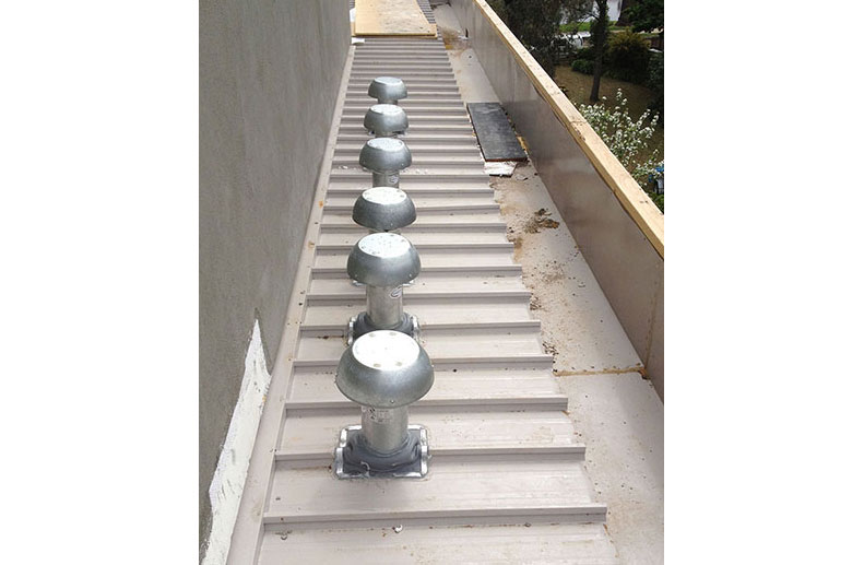6 fantech roof mounted fan cowls with ducting installed to bathrooms, kitchen and laundry with linear bar ceiling grilles matched to air conditioning grilles. operation is switched with lighting and run on timers to ensure proper ventilation. project in Maribyrnong