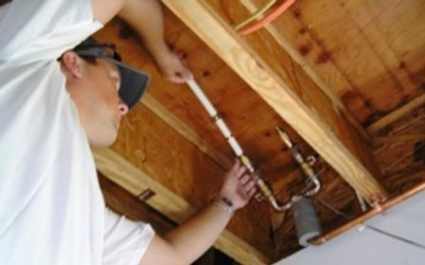 man installing heating and cooling