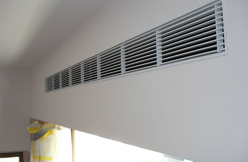 Flangless linear bar grille in bulkhead wall in St Kilda renovation installed to LG 3 phase ducted air conditioner