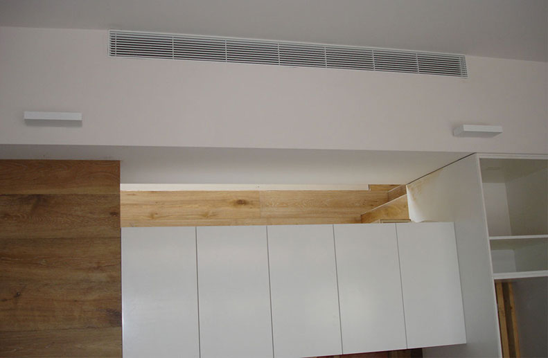 Flangless linear bar grille in bulkhead wall in St Kilda renovation installed to LG 3 phase ducted air conditioner