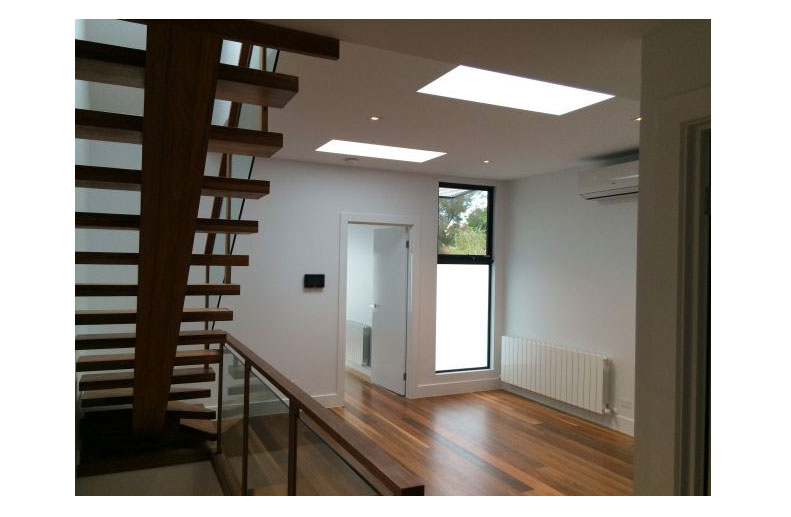 Hydronic Heating in architect designed townhouse in North Fitzroy with designer radiators and towel rails.