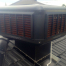 CoolBreeze QAD 125 Evaporative Cooler in Black on Tiled Roof in Cranbourne