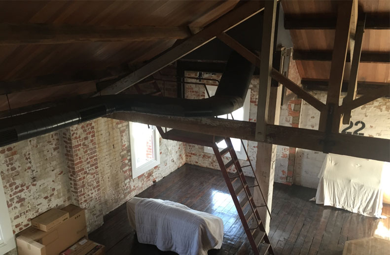 Ducted Actron With Black Spiral Duct in a Collingwood Penthouse