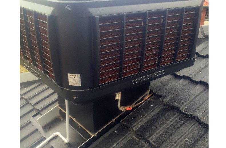 CoolBreeze QAD 125 Evaporative Cooler in Black on Tiled Roof in Cranbourne